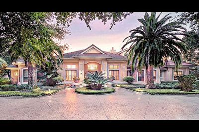 Elegant Estate Isleworth Front View with Sunset